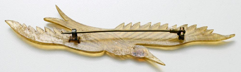 Carved horn bird brooch. French Art Nouveau.